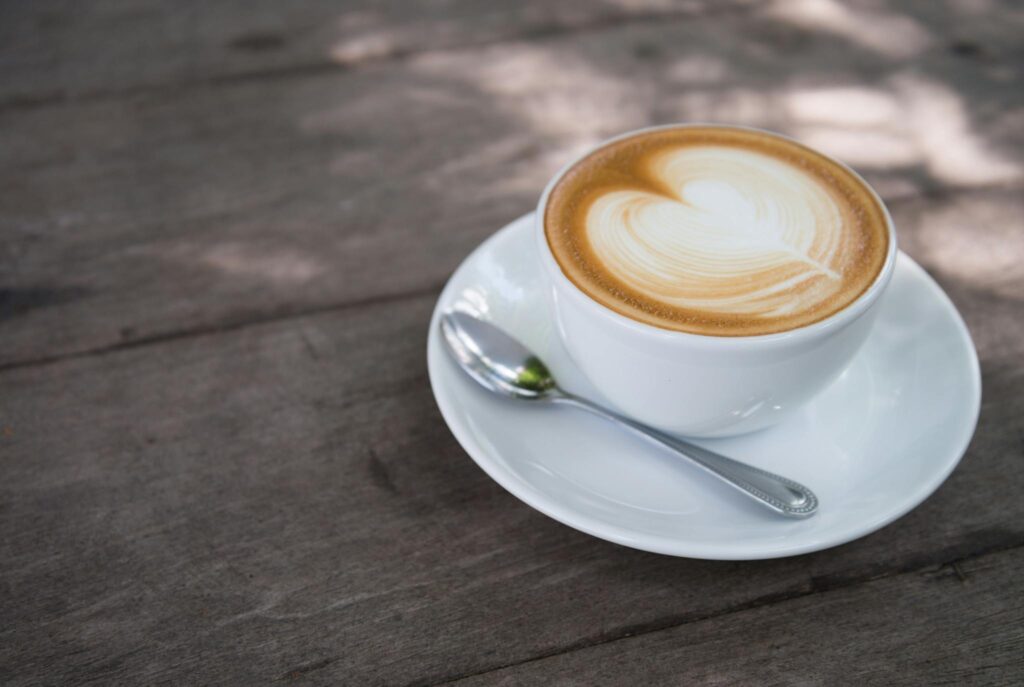 White Ceramic Coffee Cup With White Ceramic Saucer